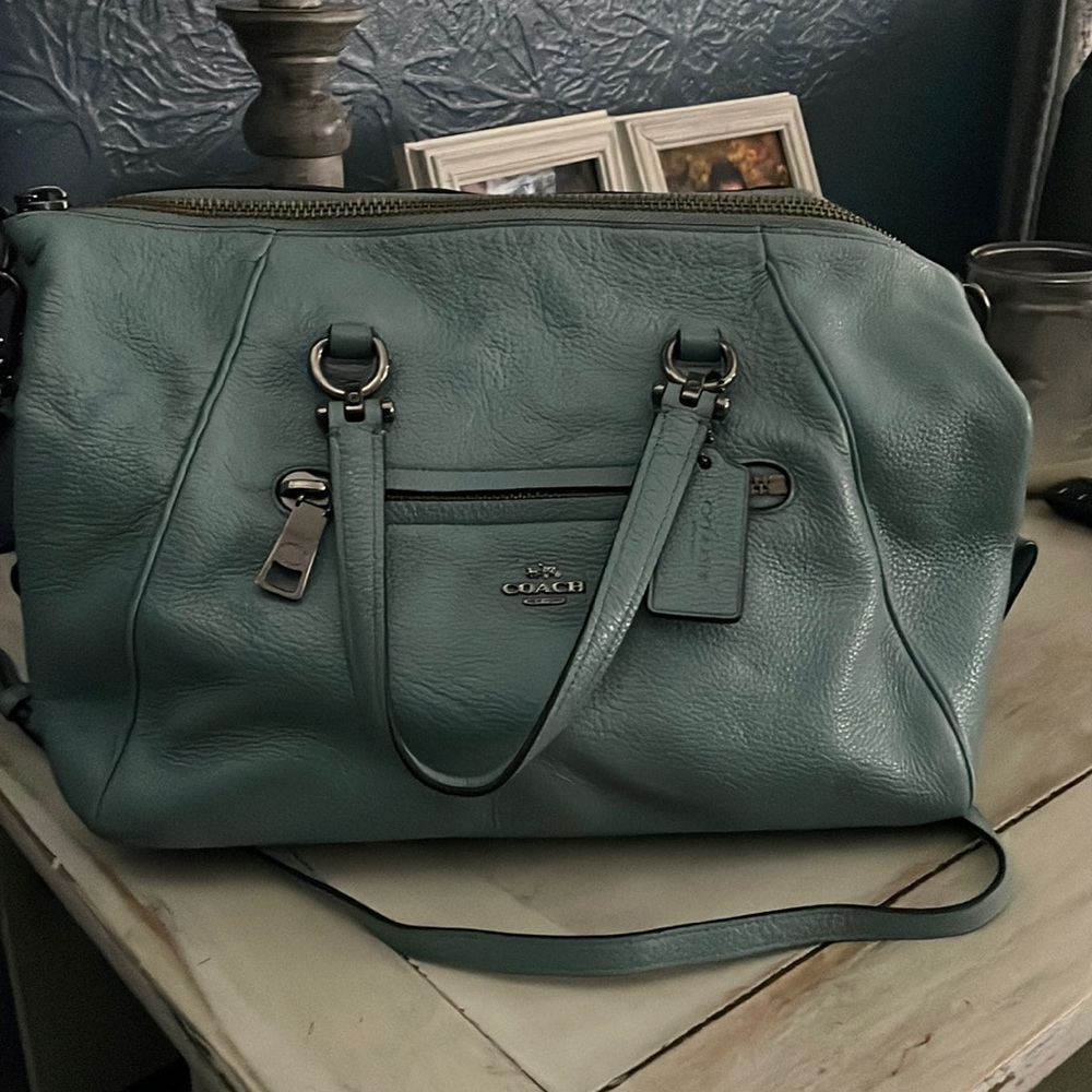 Beautiful L. Blue/Gray Coach Purse in good condition.